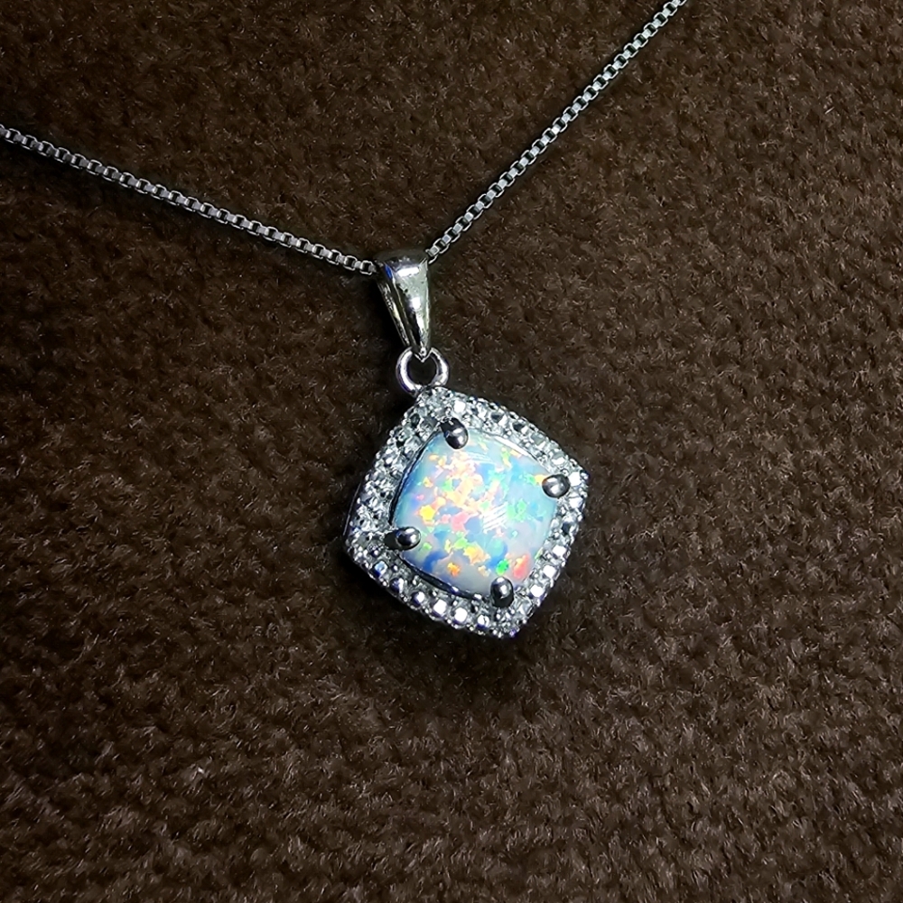 Sterling silver necklace with white sapphire surround opal from Jared Galeria